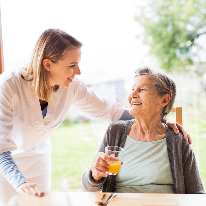 elderly woman and nurse